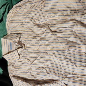 Toscano button up shirt.